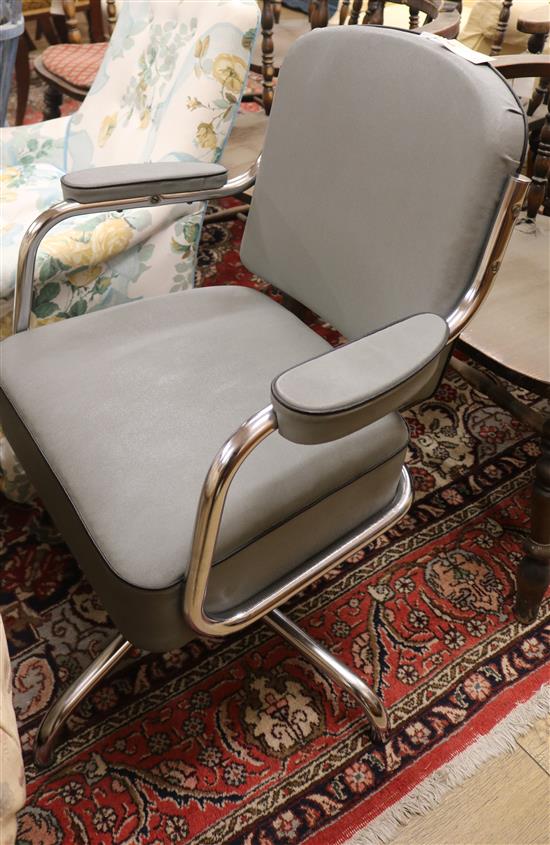 A 1950s grey leatherette and chrome chair